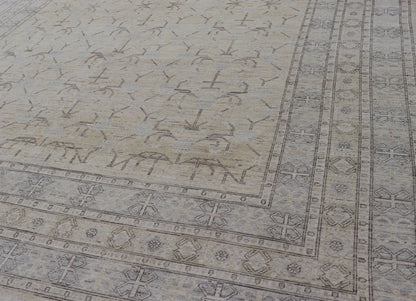 Finely Woven Khotan Rug with All - Over Geometric Pattern in Soft Yellow & Gray. Light yellow Color Background Khotan rug with All Over geometric motifs in Light yellow, gray and brown highlights. rug MP - 1310 - 541, country of origin / type: Afghanista... - Keivan Woven ArtsMP - 1310 - 541 - 4748Rug