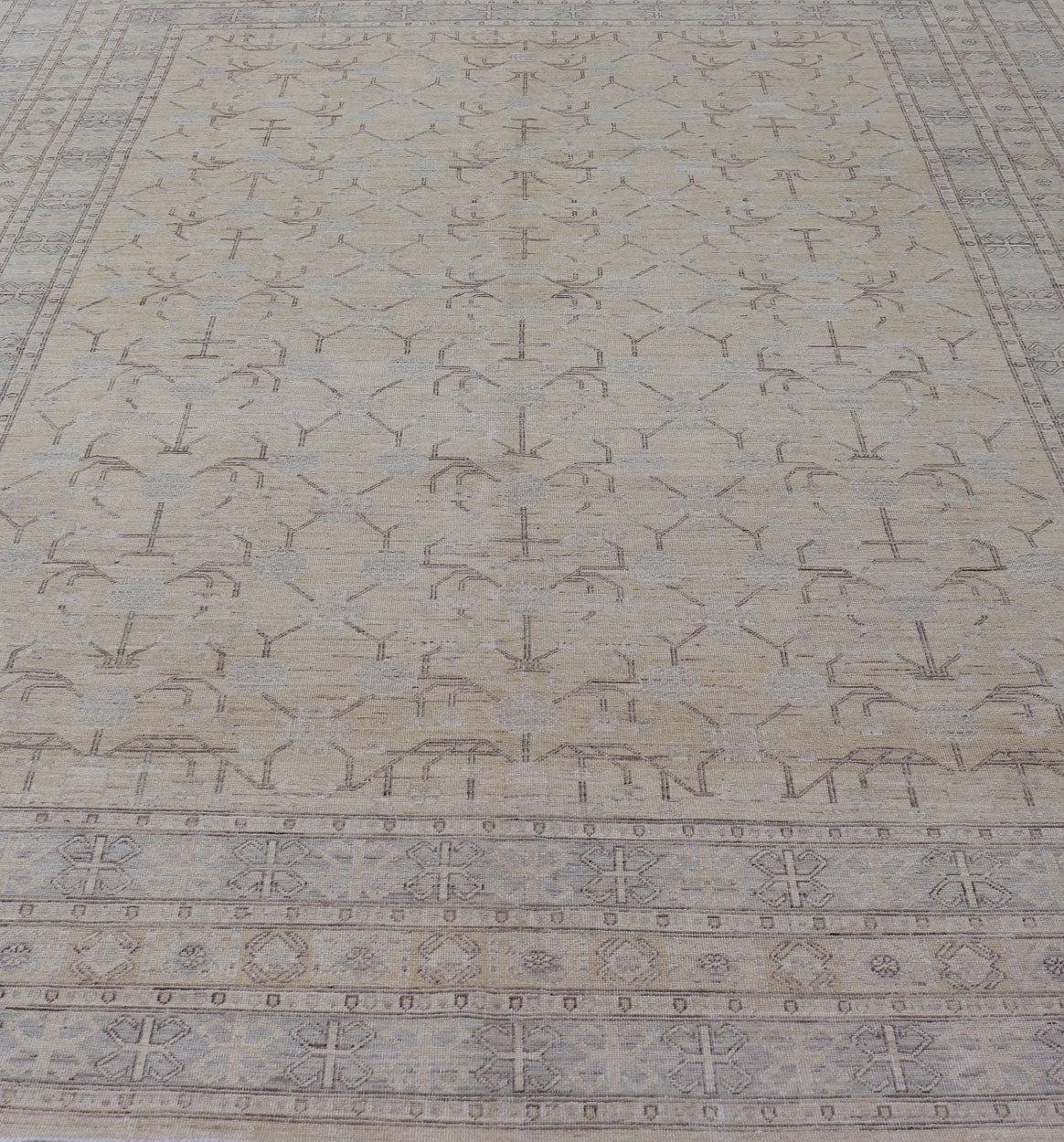 Finely Woven Khotan Rug with All - Over Geometric Pattern in Soft Yellow & Gray. Light yellow Color Background Khotan rug with All Over geometric motifs in Light yellow, gray and brown highlights. rug MP - 1310 - 541, country of origin / type: Afghanista... - Keivan Woven ArtsMP - 1310 - 541 - 4748Rug
