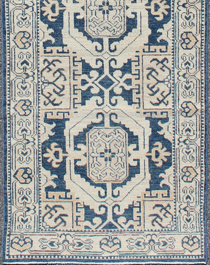 Vintage Khotan Rug with Geometric Medallions in Navy and Cream Tones Khotan with Geometric Medallions, rug MP - 1310 - 93, country of origin / type: Afghanistan / Khotan, circa Early - 21st Century. Measures: 2'11 x 10'3. This Khotan fe... - Keivan Woven ArtsMP - 1310 - 93 - 4758Rug