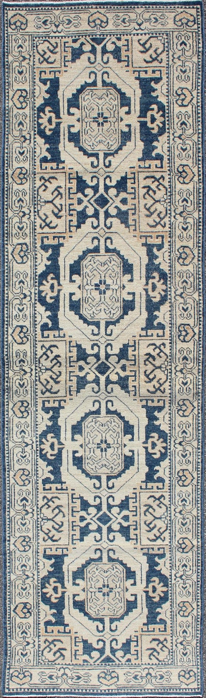 Vintage Khotan Rug with Geometric Medallions in Navy and Cream Tones Khotan with Geometric Medallions, rug MP - 1310 - 93, country of origin / type: Afghanistan / Khotan, circa Early - 21st Century. Measures: 2'11 x 10'3. This Khotan fe... - Keivan Woven ArtsMP - 1310 - 93 - 4758Rug