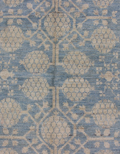 Pomegranate Design Modern Khotan Rug in Light Blue and Cream MP - 1503 - 3571 country of origin / type: Afghanistan / Khotan This Reproduction Khotan features a geometric pomegranate design flanked by a repeating pattern in the border. The entirety ... - Keivan Woven ArtsMP - 1503 - 3571 - 6436Rug