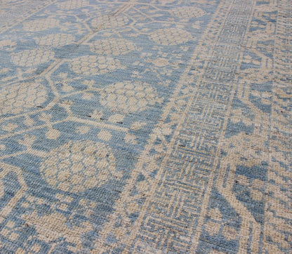Pomegranate Design Modern Khotan Rug in Light Blue and Cream MP - 1503 - 3571 country of origin / type: Afghanistan / Khotan This Reproduction Khotan features a geometric pomegranate design flanked by a repeating pattern in the border. The entirety ... - Keivan Woven ArtsMP - 1503 - 3571 - 6436Rug