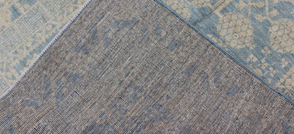 Pomegranate Design Modern Khotan Rug in Light Blue and Cream MP - 1503 - 3571 country of origin / type: Afghanistan / Khotan This Reproduction Khotan features a geometric pomegranate design flanked by a repeating pattern in the border. The entirety ... - Keivan Woven ArtsMP - 1503 - 3571 - 6436Rug