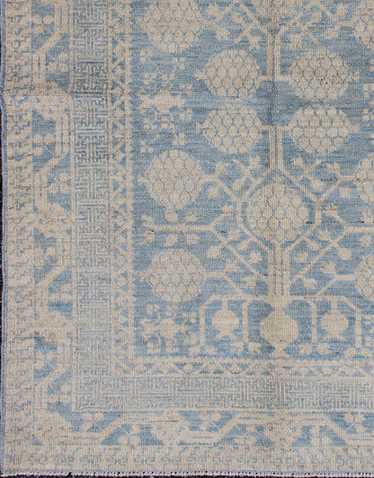 Pomegranate Design Modern Khotan Rug in Light Blue and Cream MP - 1503 - 3571 country of origin / type: Afghanistan / Khotan This Reproduction Khotan features a geometric pomegranate design flanked by a repeating pattern in the border. The entirety ... - Keivan Woven ArtsMP - 1503 - 3571 - 6436Rug