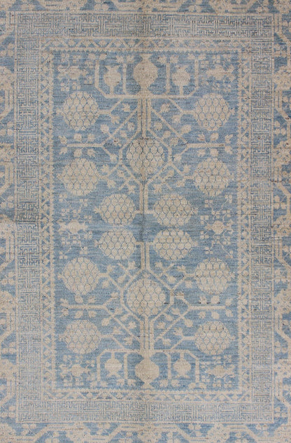 Pomegranate Design Modern Khotan Rug in Light Blue and Cream MP - 1503 - 3571 country of origin / type: Afghanistan / Khotan This Reproduction Khotan features a geometric pomegranate design flanked by a repeating pattern in the border. The entirety ... - Keivan Woven ArtsMP - 1503 - 3571 - 6436Rug