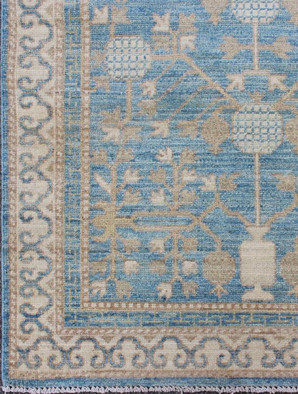 Rug with Pomegranate Design Khotan MP - 1504 - 1353 country of origin / type: Afghanistan / Khotan This Reproduction Khotan features a geometric pomegranate design flanked by a repeating pattern in the border. The entirety of the piece is rendered i... - Keivan Woven ArtsMP - 1504 - 1353 - 6442Rug