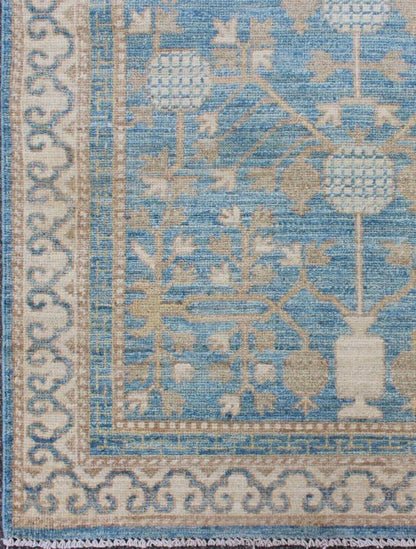 Rug with Pomegranate Design Khotan MP - 1504 - 1353 country of origin / type: Afghanistan / Khotan This Reproduction Khotan features a geometric pomegranate design flanked by a repeating pattern in the border. The entirety of the piece is rendered i... - Keivan Woven ArtsMP - 1504 - 1353 - 6442Rug