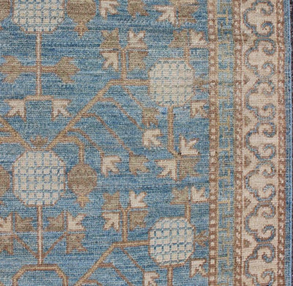 Rug with Pomegranate Design Khotan MP - 1504 - 1353 country of origin / type: Afghanistan / Khotan This Reproduction Khotan features a geometric pomegranate design flanked by a repeating pattern in the border. The entirety of the piece is rendered i... - Keivan Woven ArtsMP - 1504 - 1353 - 6442Rug