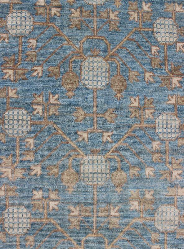 Rug with Pomegranate Design Khotan MP - 1504 - 1353 country of origin / type: Afghanistan / Khotan This Reproduction Khotan features a geometric pomegranate design flanked by a repeating pattern in the border. The entirety of the piece is rendered i... - Keivan Woven ArtsMP - 1504 - 1353 - 6442Rug