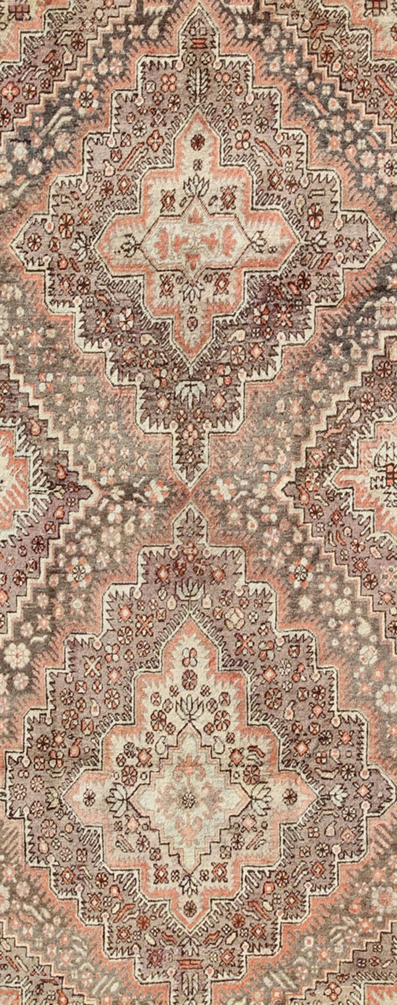 Khotan Gallery Rug This beautiful Khotan rug from East Turkestan has a wonderful, light purple border that imbues it with an Asian aesthetic. The border is encased by two guard borders, featuring a multicolored Greek key design. The field has tw... - Keivan Woven ArtsMP - 1610 - 157264 - 7865Rug