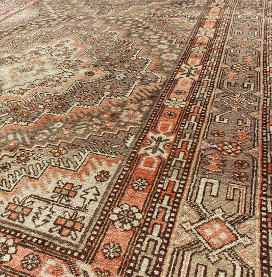 Khotan Gallery Rug This beautiful Khotan rug from East Turkestan has a wonderful, light purple border that imbues it with an Asian aesthetic. The border is encased by two guard borders, featuring a multicolored Greek key design. The field has tw... - Keivan Woven ArtsMP - 1610 - 157264 - 7865Rug