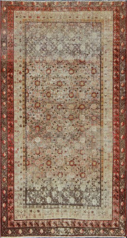 Exquisite Antique Khotan Rug with Intricate All - Over Sub - Geometric Floral Design Measures: 6'3'' x 11'5''. This Central Asian Khotan rug is an antique from the early 20th century. This piece features a traditional all - over flower pattern on a... - Keivan Woven ArtsMP - 1610 - 157276 - 7869Rug