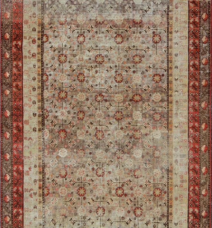 Exquisite Antique Khotan Rug with Intricate All - Over Sub - Geometric Floral Design Measures: 6'3'' x 11'5''. This Central Asian Khotan rug is an antique from the early 20th century. This piece features a traditional all - over flower pattern on a... - Keivan Woven ArtsMP - 1610 - 157276 - 7869Rug