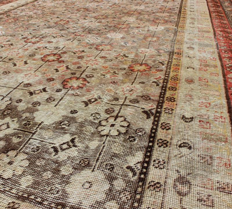 Exquisite Antique Khotan Rug with Intricate All - Over Sub - Geometric Floral Design Measures: 6'3'' x 11'5''. This Central Asian Khotan rug is an antique from the early 20th century. This piece features a traditional all - over flower pattern on a... - Keivan Woven ArtsMP - 1610 - 157276 - 7869Rug