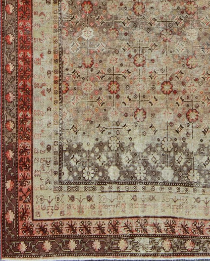 Exquisite Antique Khotan Rug with Intricate All - Over Sub - Geometric Floral Design Measures: 6'3'' x 11'5''. This Central Asian Khotan rug is an antique from the early 20th century. This piece features a traditional all - over flower pattern on a... - Keivan Woven ArtsMP - 1610 - 157276 - 7869Rug