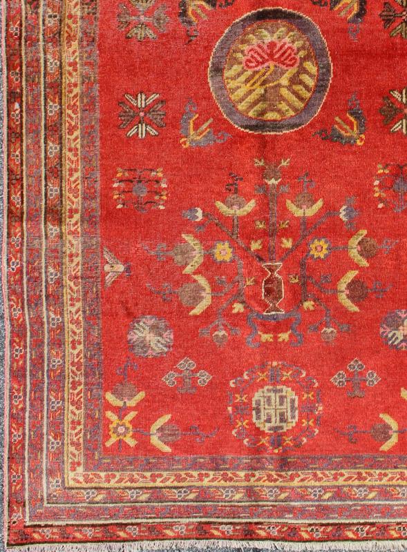 Vibrant Khotan Rug in Red with All - Over Sub - Geometric Floral Design. Measures: 4'1'' x 8'6''. This attractive antique Khotan rug is a spectacular testament to the complexity of Turkestan design. The red of the central field plays host to a st... - Keivan Woven ArtsMP - 1610 - 157698 - 7885Rug