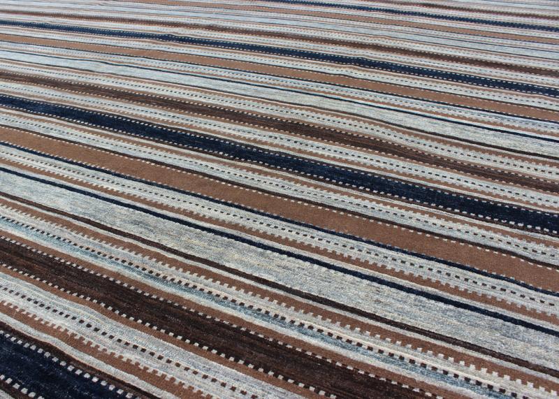 Keivan Woven Arts Fine Gabeh Rug in Stripe Design. Keivan Woven Arts rug/MP - 1703 - 1290, country of origin / type: Afghanistan Measures: 9'0 x 11'6 Made with traditions of Gabbeh from southern Iran, This finely woven rug displays a... - Keivan Woven ArtsMP - 1703 - 1290 - 8263Rug