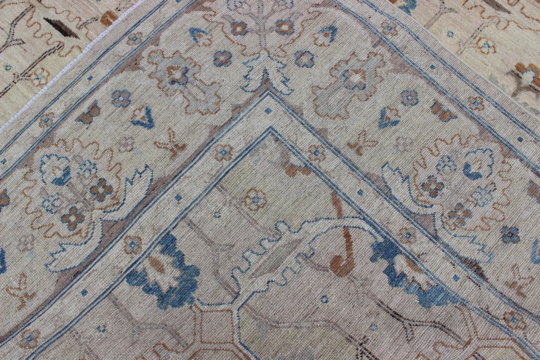 Light Khotan rug with geometric Medallions, Keivan Woven Arts / rug MP - 1703 - 7565 country of origin / type: Afghanistan / Khotan This Reproduction Khotan features a geometric all - over design flanked by a repeating pattern in the border. The entir... - Keivan Woven ArtsMP - 1703 - 7565 - 8277Rug