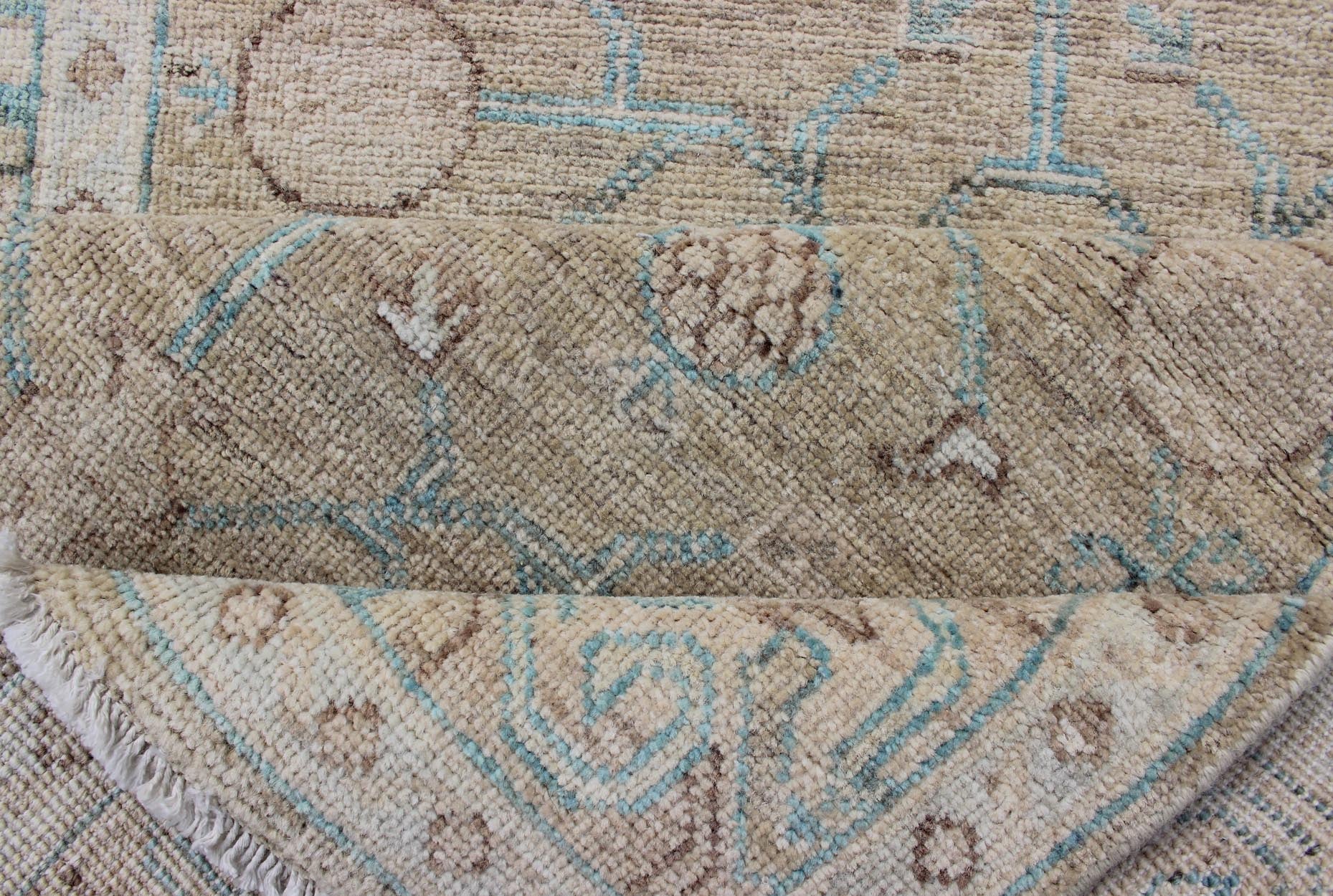 Pomegranate Khotan Design Long Runner in Soft Gold & L. Blue & Geometric Border. Long Khotan runner in Pomegranate Khotan Design, rug MP - 1910 - 10524, country of origin / type: Afghanistan / Khotan This Khotan features a geometric all - over Pom... - Keivan Woven ArtsMP - 1910 - 10524 - 12222Rug