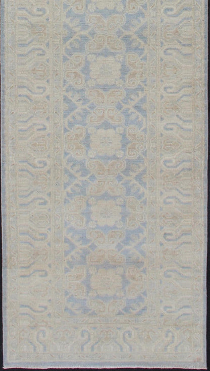 Afghan Khotan Runner with Geometric Design in Shades of Powder Blue and Tan Keivan Woven Arts / rug MP - 1911 - 10727, country of origin / type: Afghanistan / Khotan This Reproduction Khotan features a geometric all - over design flanked by a repeatin... - Keivan Woven ArtsMP - 1911 - 10727 - 12301Rug