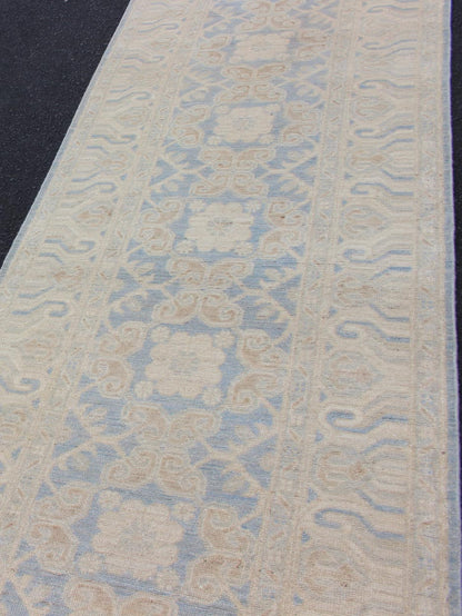 Afghan Khotan Runner with Geometric Design in Shades of Powder Blue and Tan Keivan Woven Arts / rug MP - 1911 - 10727, country of origin / type: Afghanistan / Khotan This Reproduction Khotan features a geometric all - over design flanked by a repeatin... - Keivan Woven ArtsMP - 1911 - 10727 - 12301Rug