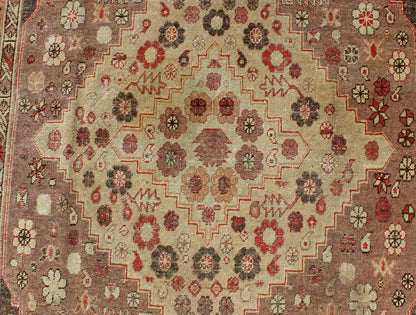 Antique Khotan Medallion Rug in Neutrals and Blush with Floral Motifs All - Over Measures: 6'4 x 11'6 This beautiful Khotan rug, from early 20th century Turkestan features layered medallions in geometric and diamond shapes. The field and ... - Keivan Woven ArtsMP - 252 - 2125Rug