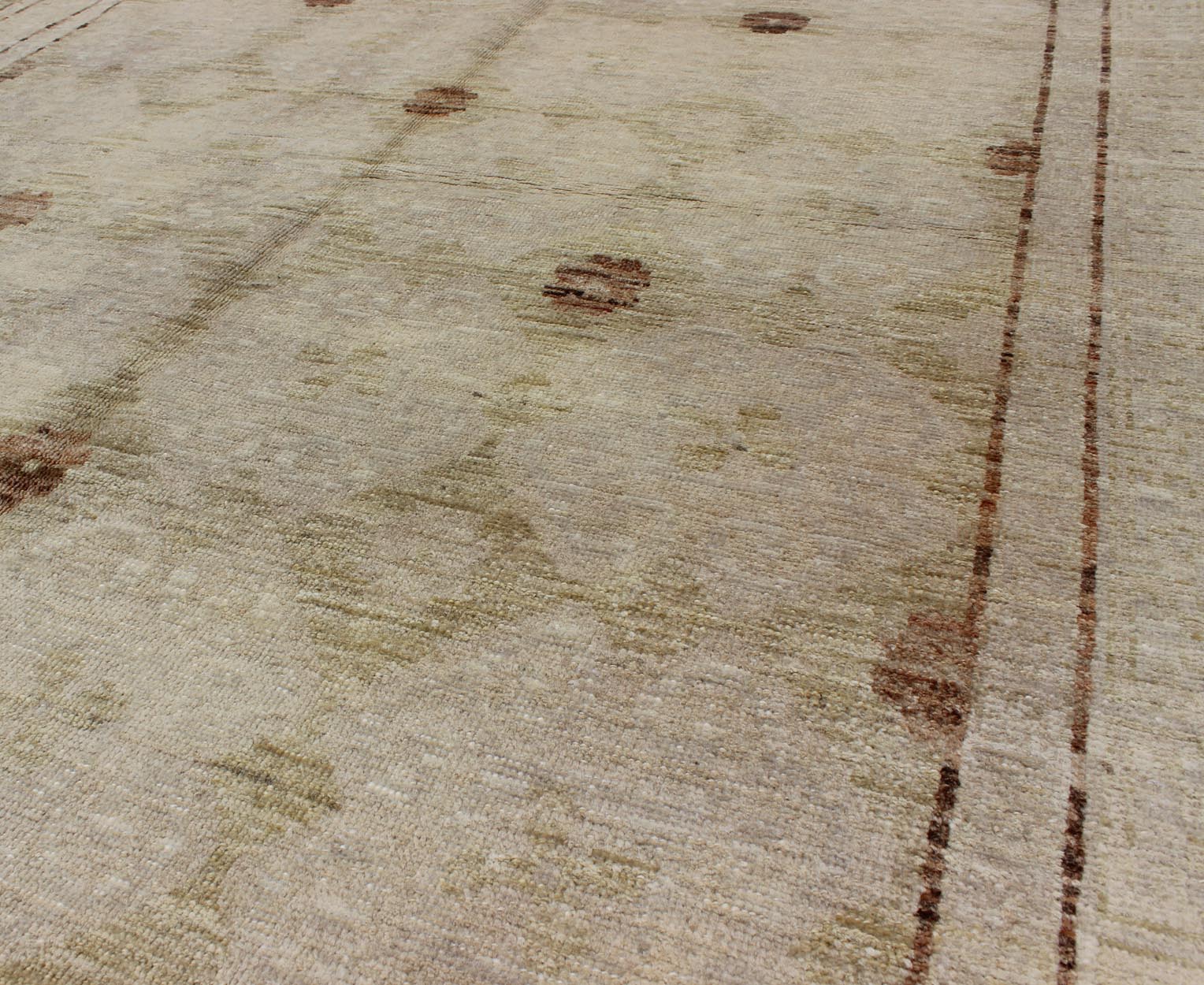 Rug with All - over Khotan Design with Geometric Motifs MP - 879 - 10, country of origin / type: Afghanistan / Khotan This Reproduction Khotan features a geometric all - over design flanked by a repeating pattern in the border. The entirety of the piece... - Keivan Woven ArtsMP - 879 - 10 - 3021Rug