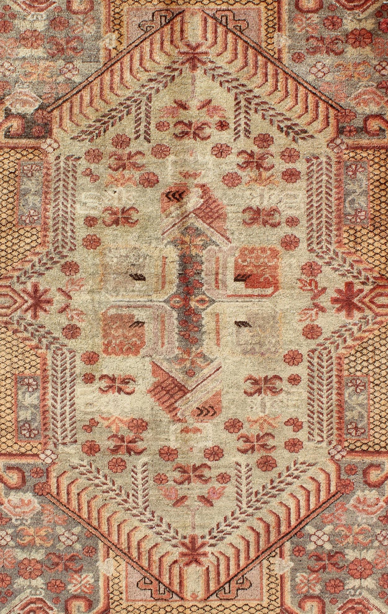 Antique Khotan Rug with Unique Pattern in Gray Border, soft Yellow Green field, Red, Red Orange, Lt. Green & Brown. Khotan Antique Rug with Exquisite Tribal Patterns in Gray, Light blue, Orange, Lt. Green, Orange, Sand, Taupe. Keivan Woven Arts... - Keivan Woven ArtsMP - 884 - 113550 - 3025Rug