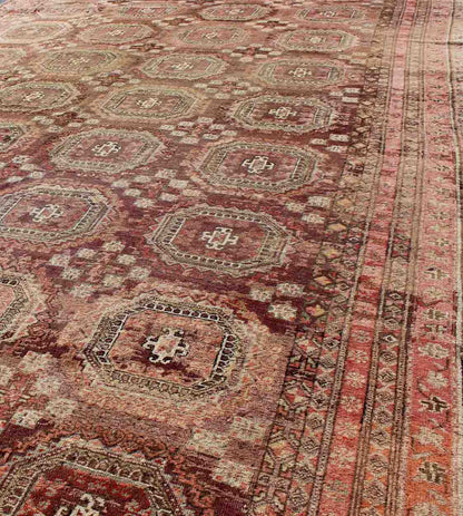 Antique Khotan rug with repeating medallion design in maroon / red, mpc - 538, country of origin / type: Russia / tribal, circa 1900 This piece is a rare antique carpet from Turkestan with delightful colors and all - over repeating medallion design.... - Keivan Woven ArtsMPC - 538 - 8988Rug
