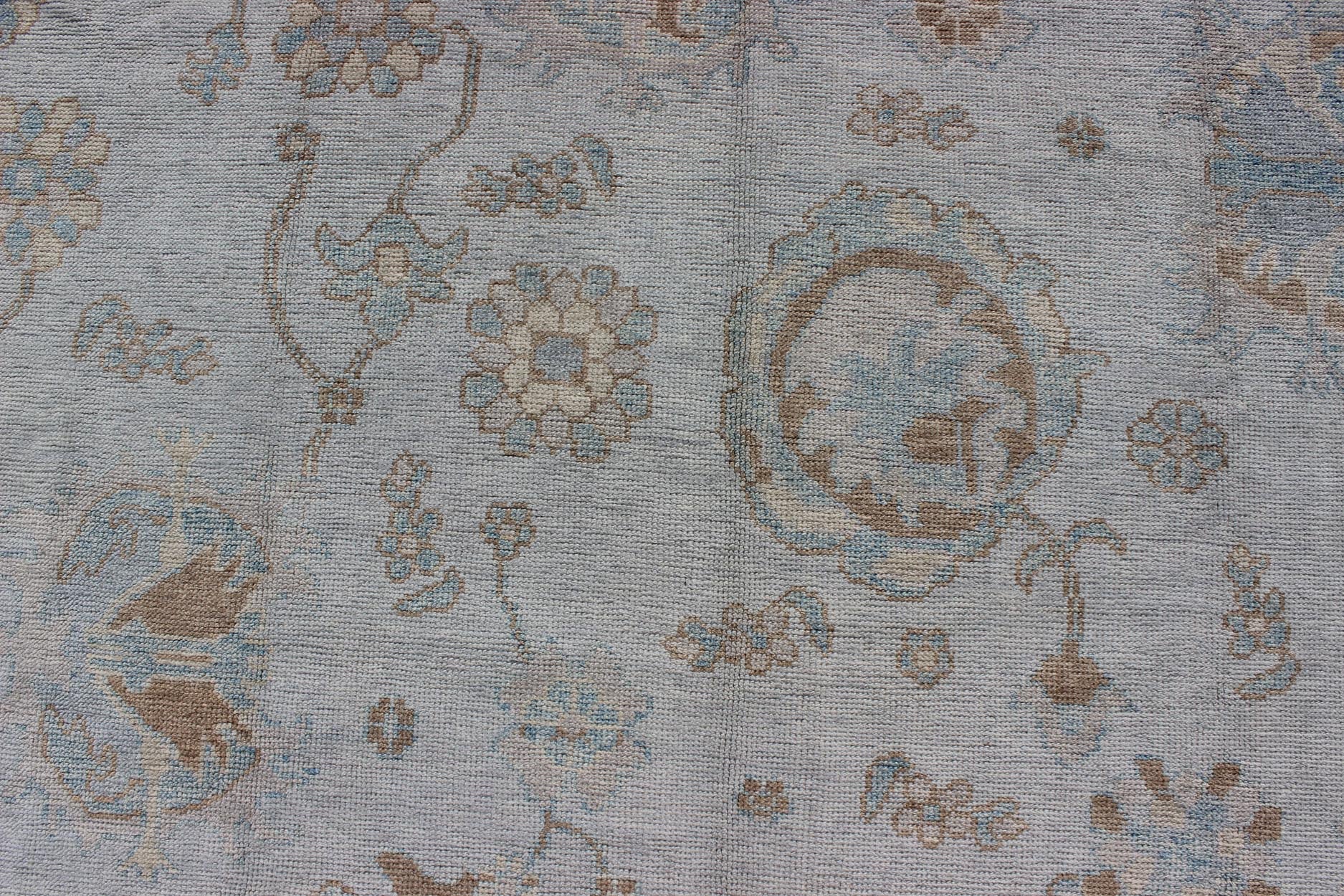 Large Turkish Oushak Rug with Neutral Color Palette in Off White, Light Blue. All - over flower design Turkish Oushak rug with neutral color palette with Off White background, tan and blush border with Light Blue and light brown and salmon accent... - Keivan Woven ArtsMSD - 3384 - 6145Rug