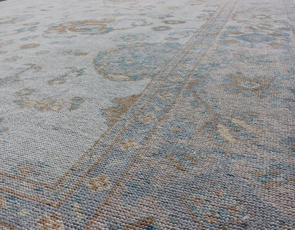 Large Turkish Oushak Rug with Neutral Color Palette in Off White, Light Blue. All - over flower design Turkish Oushak rug with neutral color palette with Off White background, tan and blush border with Light Blue and light brown and salmon accent... - Keivan Woven ArtsMSD - 3384 - 6145Rug