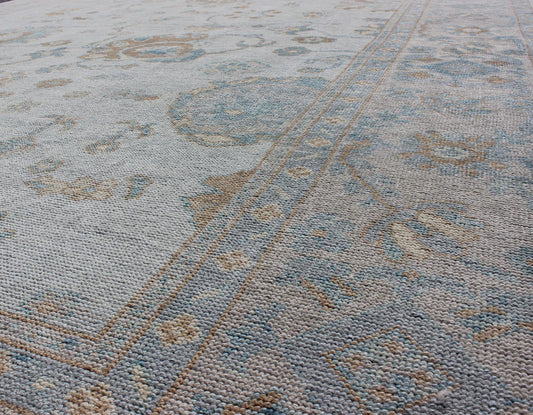 Large Turkish Oushak Rug with Neutral Color Palette in Off White, Light Blue. All - over flower design Turkish Oushak rug with neutral color palette with Off White background, tan and blush border with Light Blue and light brown and salmon accent... - Keivan Woven ArtsMSD - 3384 - 6145Rug