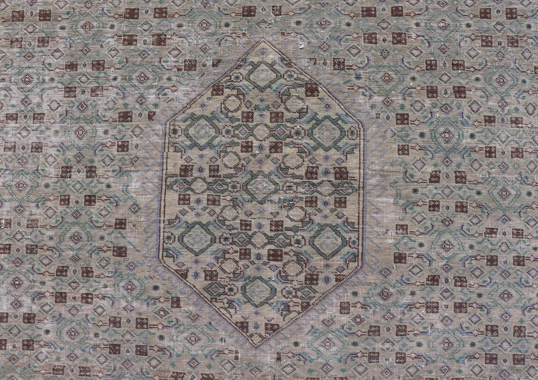 Vintage Persian Tabriz Rug With Floral Medallion in Earthy Tones With Brown. Keivan Woven Arts / rug MSE - 1131, country of origin / type: Iran / Tabriz, circa 1960. Measures: 6'1 x 9'3 This mid - 20th century, handwoven vintage Persian Tabriz rug ... - Keivan Woven ArtsMSE - 1131 - 25594Rug