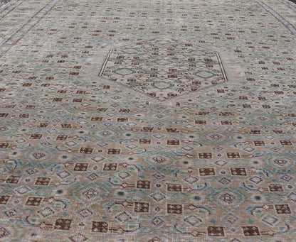 Vintage Persian Tabriz Rug With Floral Medallion in Earthy Tones With Brown. Keivan Woven Arts / rug MSE - 1131, country of origin / type: Iran / Tabriz, circa 1960. Measures: 6'1 x 9'3 This mid - 20th century, handwoven vintage Persian Tabriz rug ... - Keivan Woven ArtsMSE - 1131 - 25594Rug