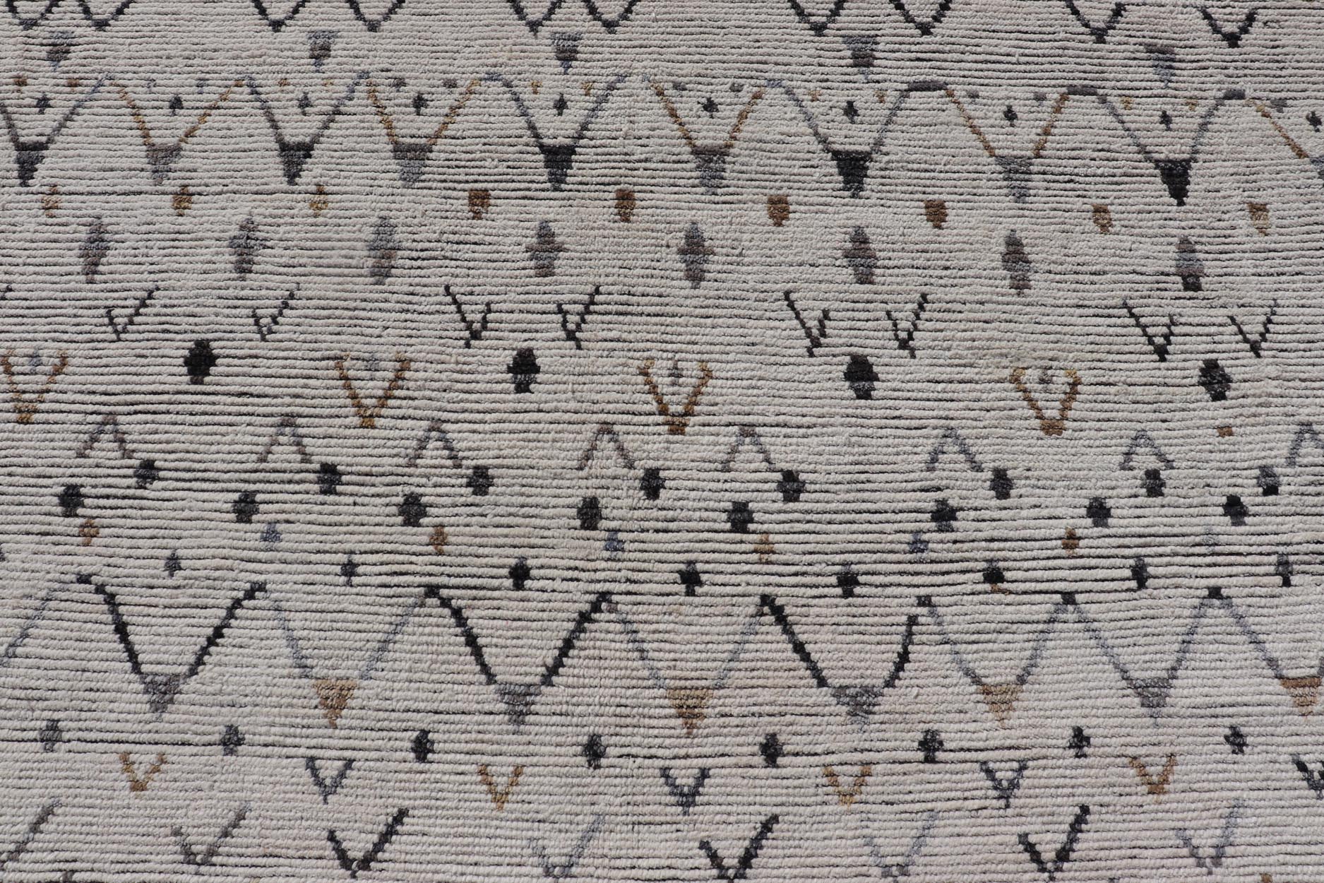 Keivan Woven Arts Modern Moroccan Rug in Neutral Tones With Subdued Design With Pops of Charcoal. Keivan Woven Arts / rug MSE - 12500, country of origin / type: Afghanistan / Modern Causal. Measures: 12'1 x 17'6 The subdued design of this rug make... - Keivan Woven ArtsMSE - 12500 - 25353Rugs