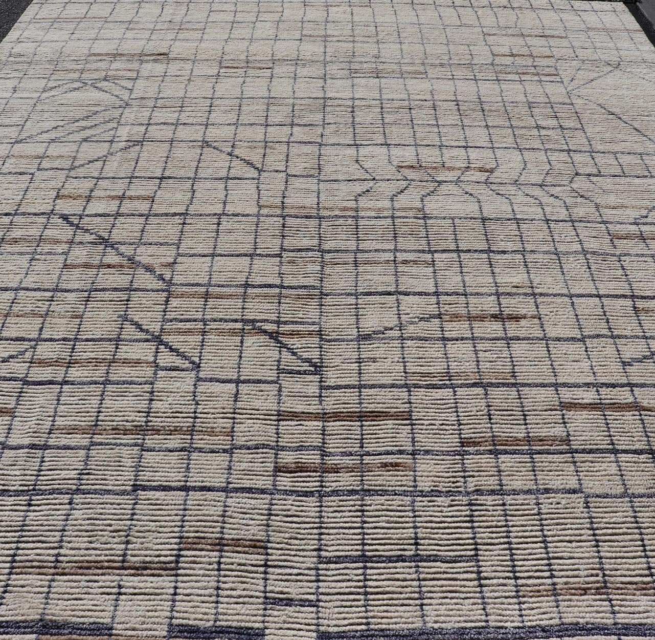 Modern Moroccan Rug in Neutral Tones with Subdued Design with Pops of Blue. Keivan Woven Arts / rug MSE - 12575, country of origin / type: Afghanistan / Rug Early 21st Century. Measures: 9'10 x 14'1 The subdued design of this rug makes it perfect... - Keivan Woven ArtsMSE - 12575 - 25395Rug