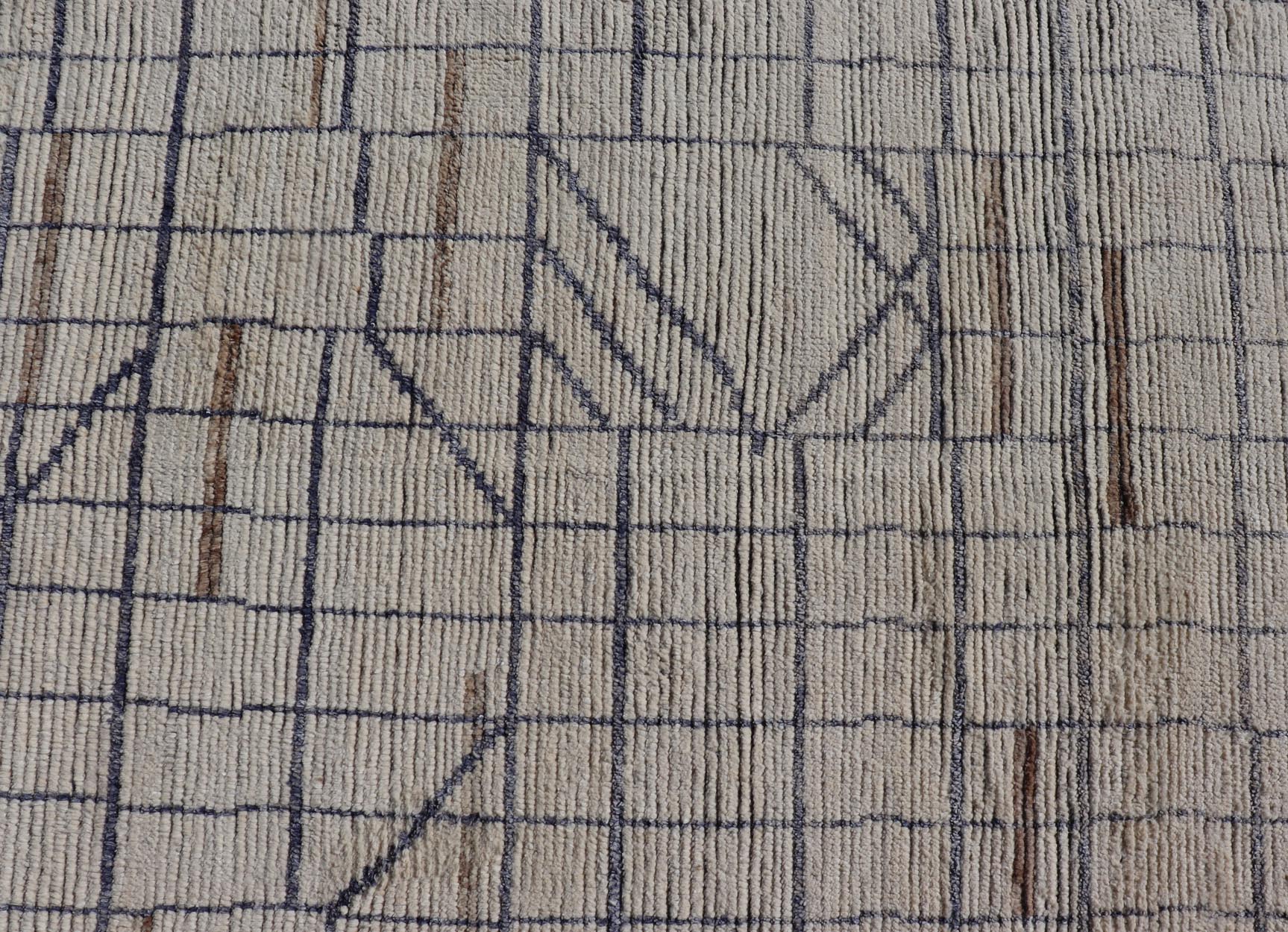 Modern Moroccan Rug in Neutral Tones with Subdued Design with Pops of Blue. Keivan Woven Arts / rug MSE - 12575, country of origin / type: Afghanistan / Rug Early 21st Century. Measures: 9'10 x 14'1 The subdued design of this rug makes it perfect... - Keivan Woven ArtsMSE - 12575 - 25395Rug