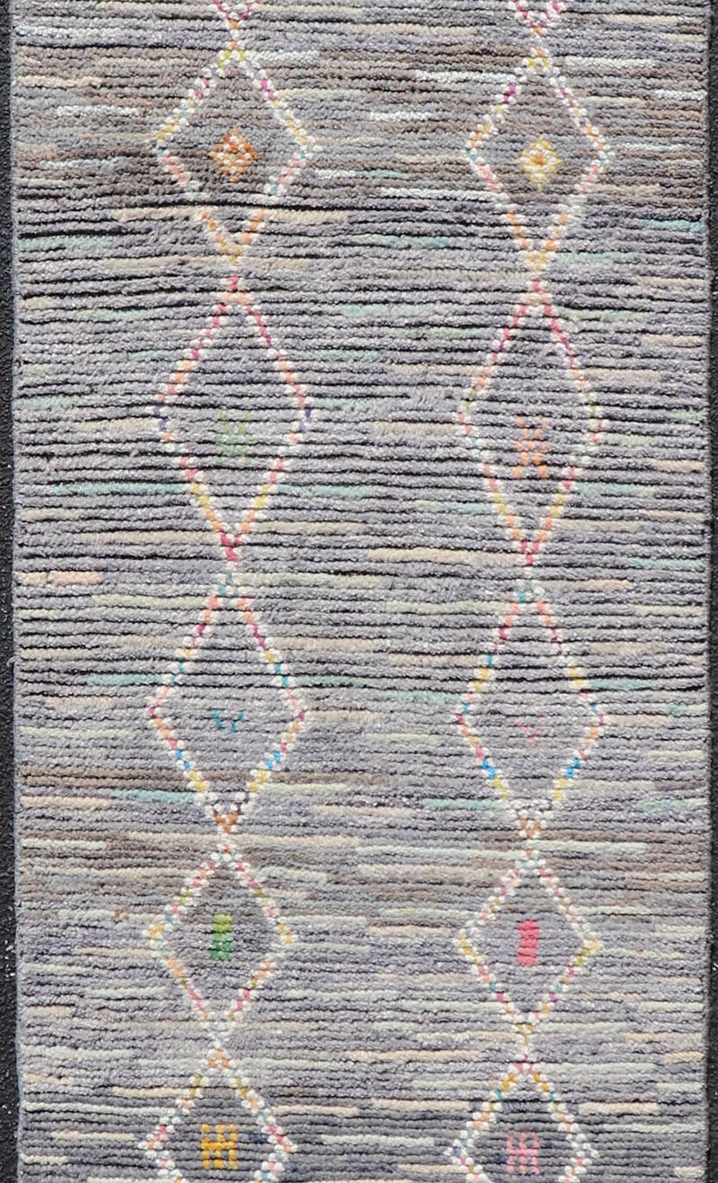Modern Moroccan Tribal Designed Runner in Pastels Colors On A Grey Ground. Keivan Woven Arts; rug MSE - 12807 Country of Origin: Afghanistan Type: Modern Casual Design: All - Over, Tribal, Sub - Geometric. Measures: 2'5 x 8'4 This Moroccan beautiful ... - Keivan Woven ArtsMSE - 12807 - 25461Rug