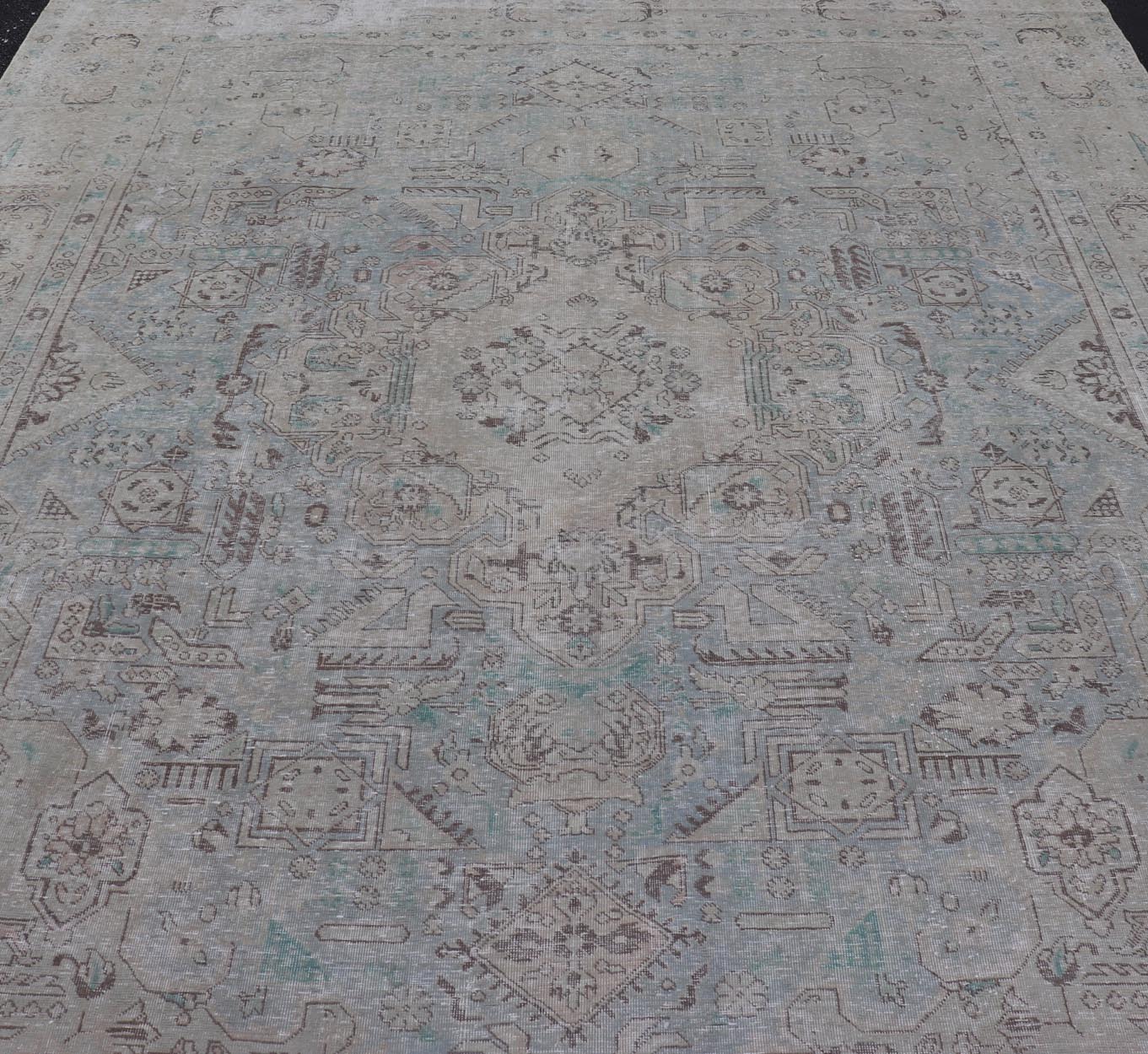 Keivan Woven Arts Vintage Distressed Persian Tabriz Rug in Light Blue and Earth Tones. Vintage Distressed Persian Rug. Keivan Woven Arts / rug MSE - 1512, country of origin / type: Iran / Tabriz, circa 1960. Measures: 10'0 x 12'4 This mid... - Keivan Woven ArtsMSE - 1512 - 25569Rug