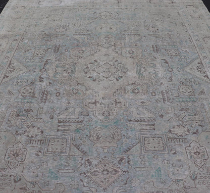 Keivan Woven Arts Vintage Distressed Persian Tabriz Rug in Light Blue and Earth Tones. Vintage Distressed Persian Rug. Keivan Woven Arts / rug MSE - 1512, country of origin / type: Iran / Tabriz, circa 1960. Measures: 10'0 x 12'4 This mid... - Keivan Woven ArtsMSE - 1512 - 25569Rug