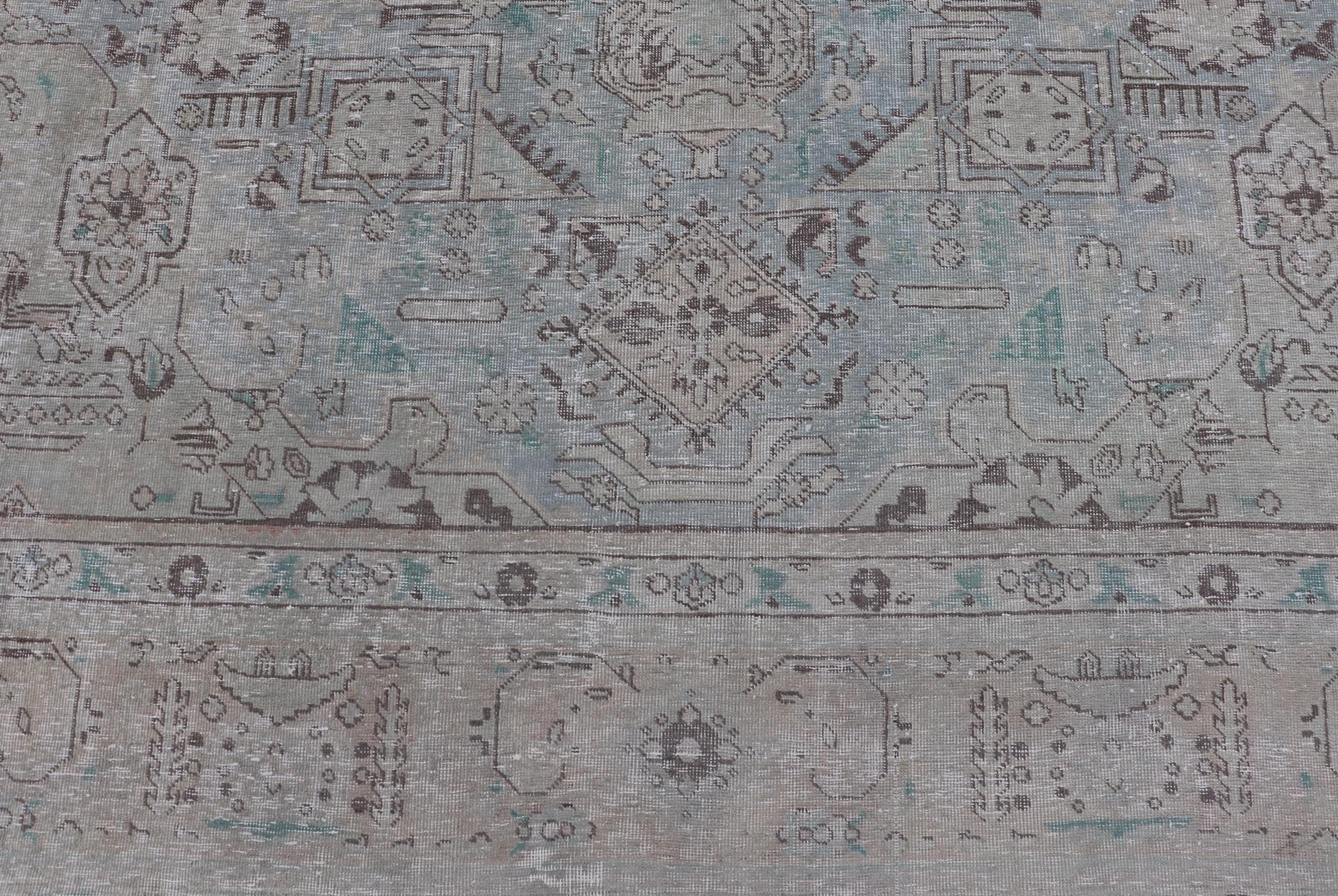 Keivan Woven Arts Vintage Distressed Persian Tabriz Rug in Light Blue and Earth Tones. Vintage Distressed Persian Rug. Keivan Woven Arts / rug MSE - 1512, country of origin / type: Iran / Tabriz, circa 1960. Measures: 10'0 x 12'4 This mid... - Keivan Woven ArtsMSE - 1512 - 25569Rug