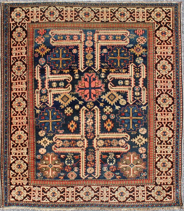 Antique Caucasian Karaghashli Rug The archetypal motifs in this piece are accompanied by a tower of stacked polygons with small V - shaped indentations, a Karaghashli rug hallmark. Each decorative foil is embellished with eight - armed brackets and ... - Keivan Woven ArtsN15 - 0101 - 80Rug