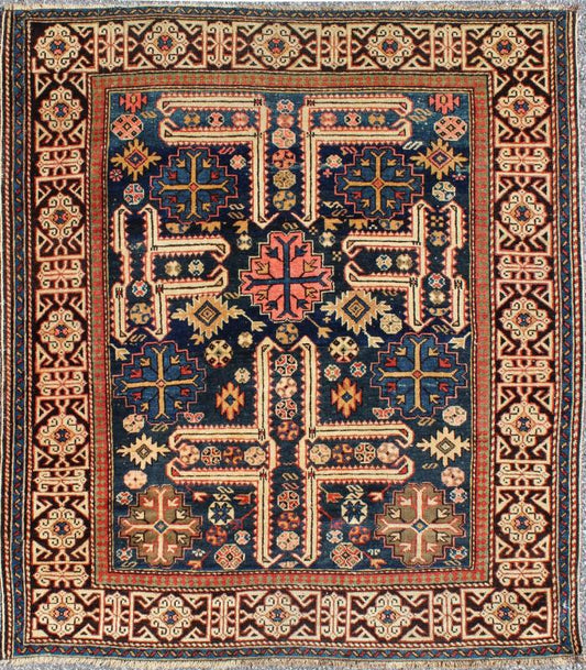 Antique Caucasian Karaghashli Rug The archetypal motifs in this piece are accompanied by a tower of stacked polygons with small V - shaped indentations, a Karaghashli rug hallmark. Each decorative foil is embellished with eight - armed brackets and ... - Keivan Woven ArtsN15 - 0101 - 80Rug