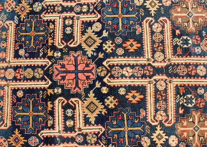 Antique Caucasian Karaghashli Rug The archetypal motifs in this piece are accompanied by a tower of stacked polygons with small V - shaped indentations, a Karaghashli rug hallmark. Each decorative foil is embellished with eight - armed brackets and ... - Keivan Woven ArtsN15 - 0101 - 80Rug