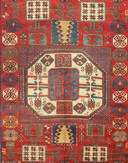 Antique Kazak Karachopf Rug with Octagon Medallion in Red, Blue and Green Tones. Keivan Woven Arts / rug N15 - 0306, country of origin / type: Caucus / Karachopf, circa 1880. Measures: 6' x 7.1. Karachopf rugs are among the most desirable Caucasian... - Keivan Woven ArtsN15 - 0306 - 34Rug