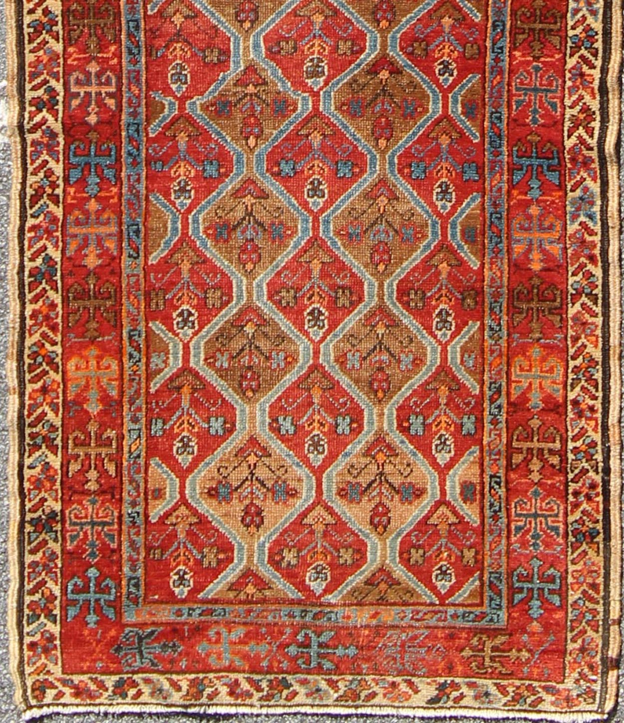 Antique Serapi Runner with All - Over, Multicolor Geometric Design Measures: 2'10'' x 10'9''. This antique Serapi - Heriz displays a charming and rich combination of various jewel tones. The geometric diamond shapes are repeated in different form... - Keivan Woven ArtsN15 - 0502 - 7103Rug