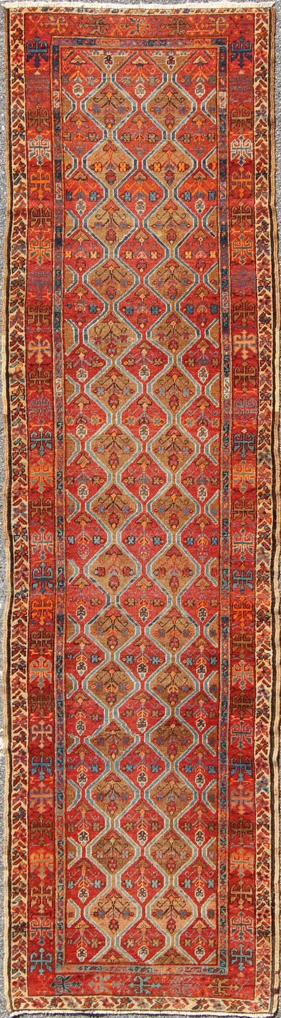 Antique Serapi Runner with All - Over, Multicolor Geometric Design Measures: 2'10'' x 10'9''. This antique Serapi - Heriz displays a charming and rich combination of various jewel tones. The geometric diamond shapes are repeated in different form... - Keivan Woven ArtsN15 - 0502 - 7103Rug