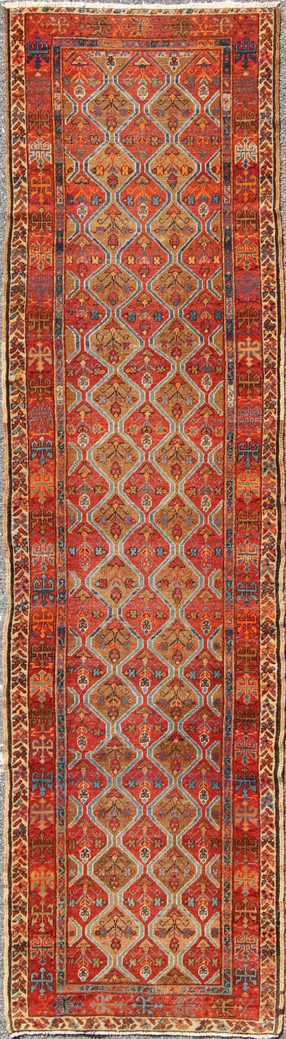 Antique Serapi Runner with All - Over, Multicolor Geometric Design Measures: 2'10'' x 10'9''. This antique Serapi - Heriz displays a charming and rich combination of various jewel tones. The geometric diamond shapes are repeated in different form... - Keivan Woven ArtsN15 - 0502 - 7103Rug