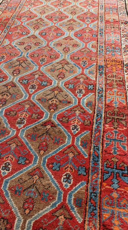 Antique Serapi Runner with All - Over, Multicolor Geometric Design Measures: 2'10'' x 10'9''. This antique Serapi - Heriz displays a charming and rich combination of various jewel tones. The geometric diamond shapes are repeated in different form... - Keivan Woven ArtsN15 - 0502 - 7103Rug