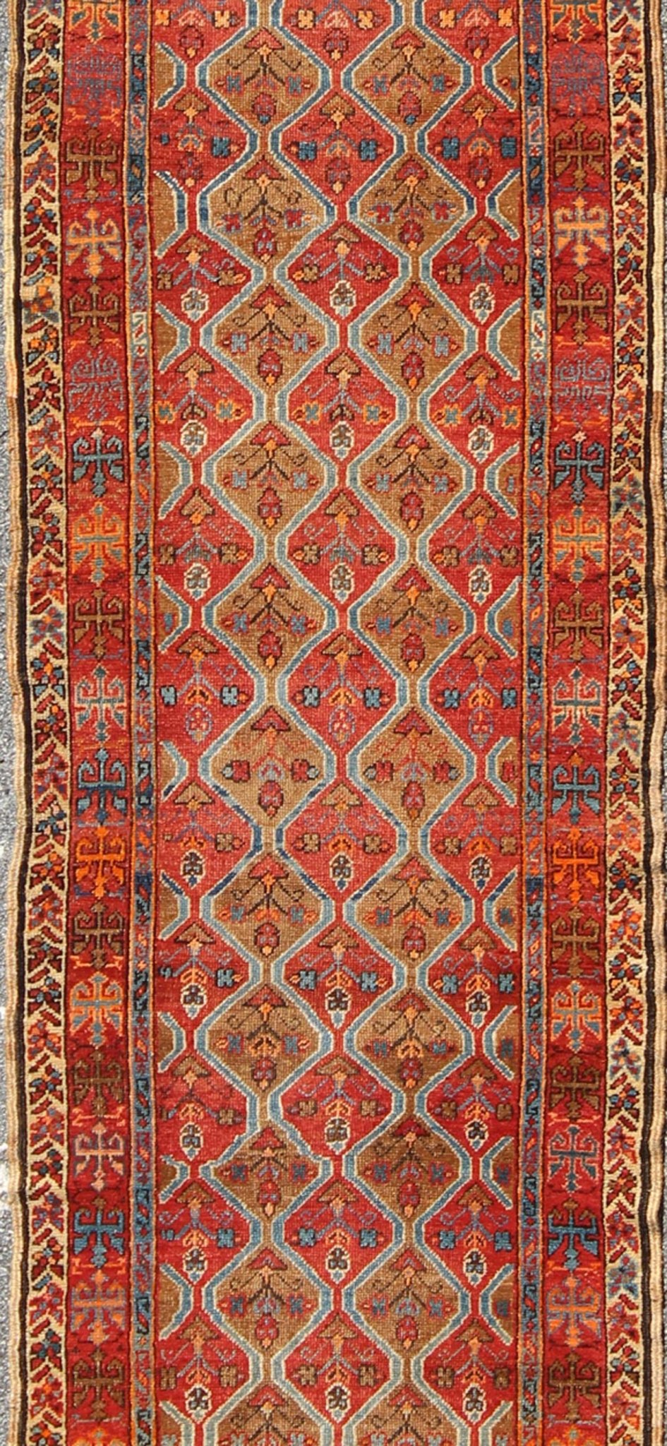 Antique Serapi Runner with All - Over, Multicolor Geometric Design Measures: 2'10'' x 10'9''. This antique Serapi - Heriz displays a charming and rich combination of various jewel tones. The geometric diamond shapes are repeated in different form... - Keivan Woven ArtsN15 - 0502 - 7103Rug